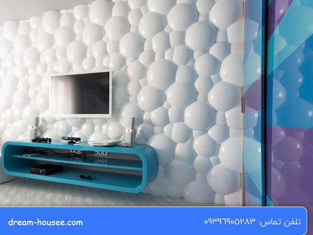 پنل سه بعدی در منزل برای پشت تلوزیون اجرا شده به رنگ سفید و اشکال دایره رنگ